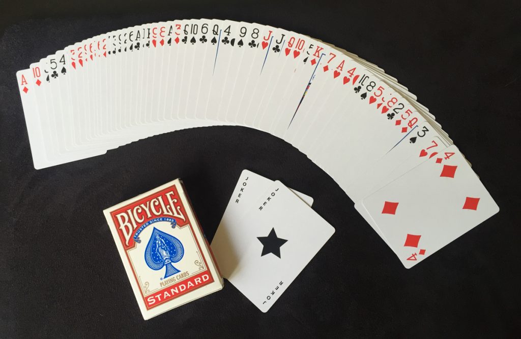 A deck of cards - 52 cards, jokers and box